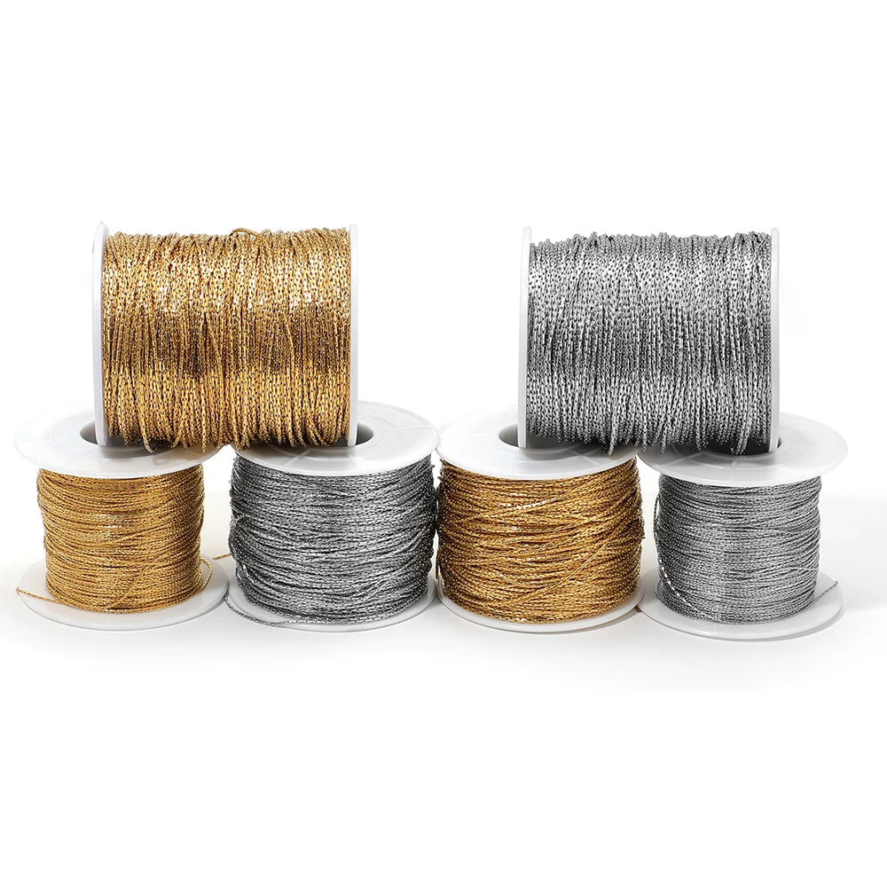 Set of gold and silver thin wire chains on spools for DIY jewelry