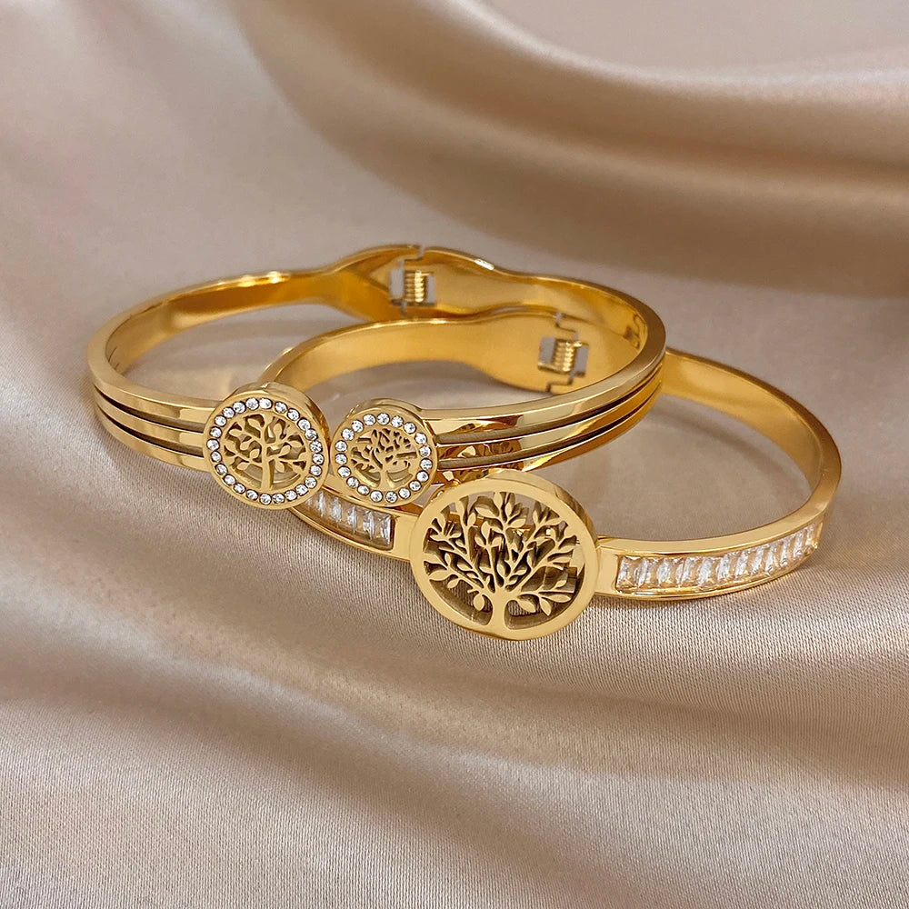 Gold-tone stackable cuff bracelets with tree-of-life center and round zircon stones