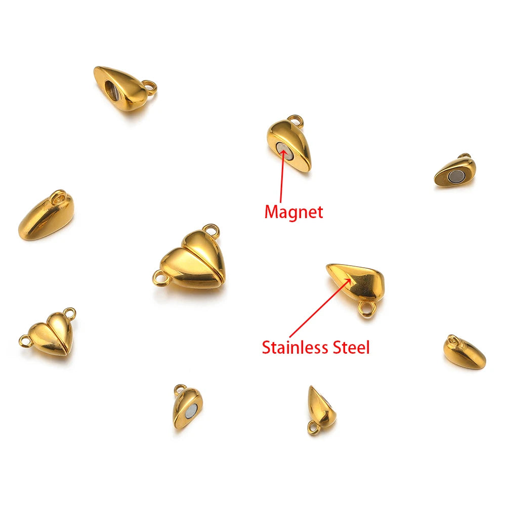 Gold heart-shaped magnet clasp connectors, small set with eyelet rings on multiple sides.