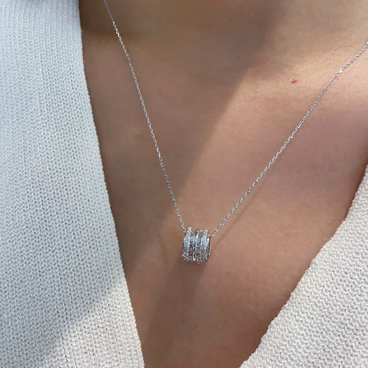 Crystal CZ circle pendant necklace with silver-tone chain and round pave pendant