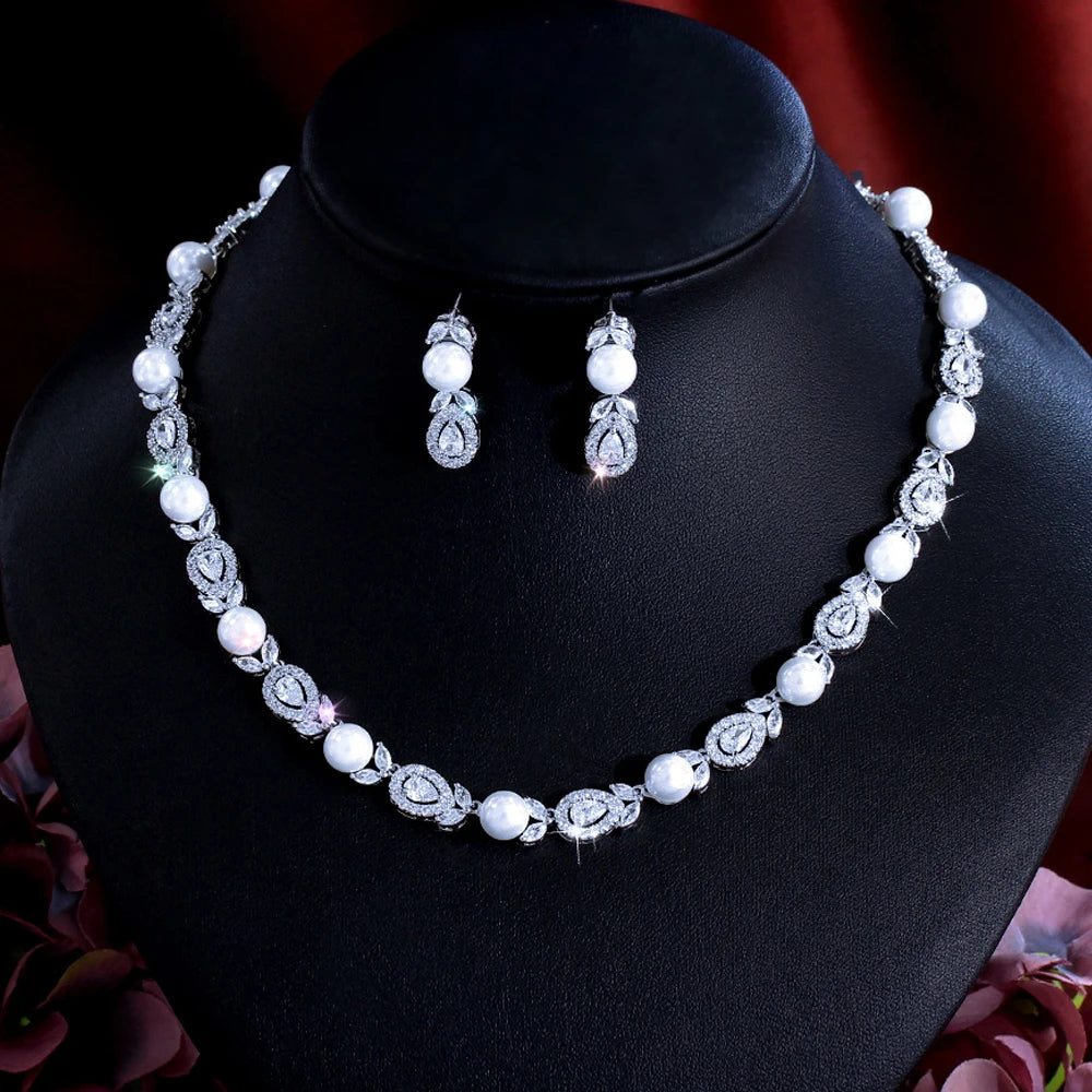 White-tone pearl bead necklace with cubic zirconia oval links and drop earrings set