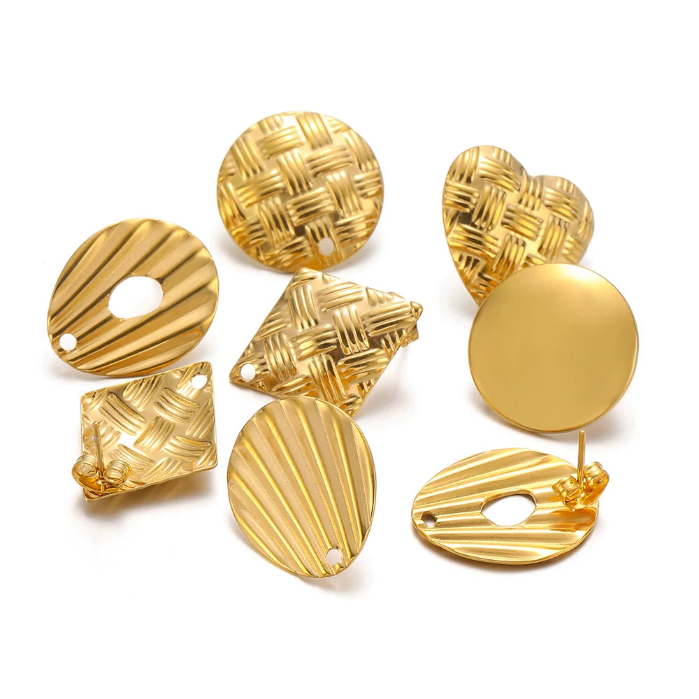 Gold heart-shaped braid earring findings with textured woven and ribbed surfaces, with holes
