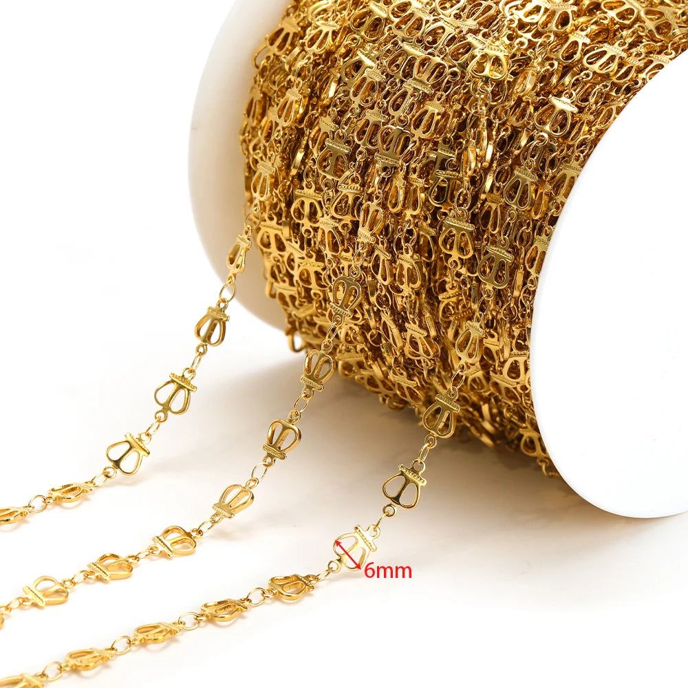Gold hollow chain with loop links, 6mm width shown, on a white spool
