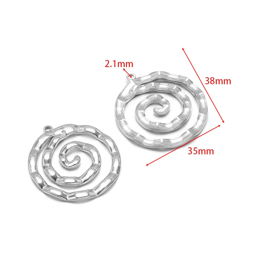 Silver spiral coil charm pendant with scalloped edge and hanging loop
