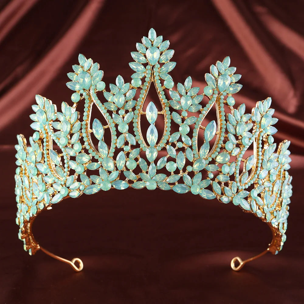 Aqua rhinestone tiara with ornate floral crown and oval faceted centerpiece links