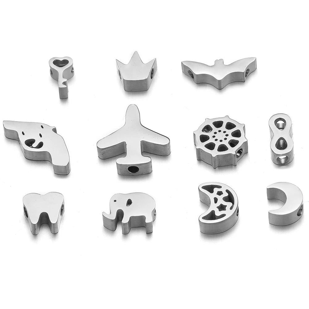 Silver-tone stainless steel spacer beads, assorted animal and symbol shapes with holes