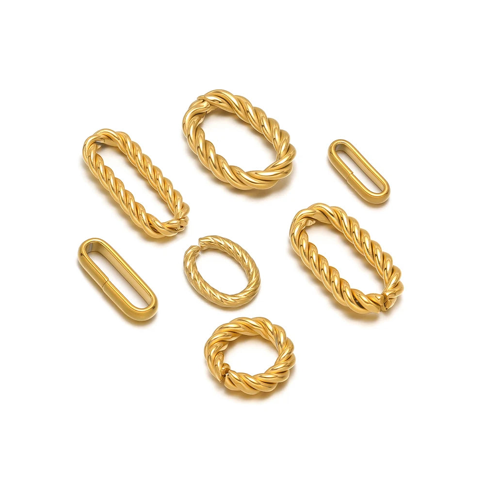 Set of gold oval twist-open charms with braided metal bezels, small connector pieces
