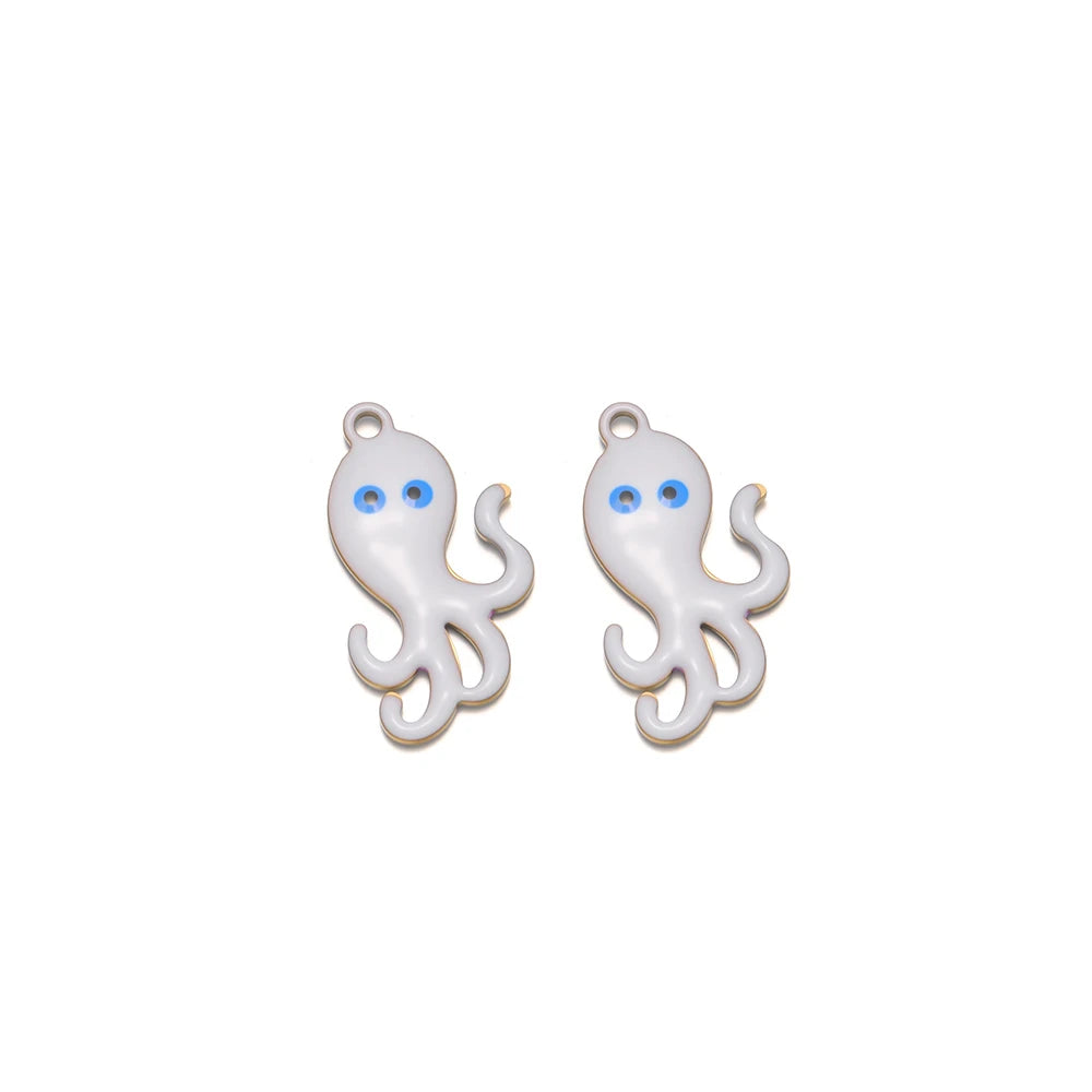 Two white enamel octopus pendant charms with silver-tone hanging loops