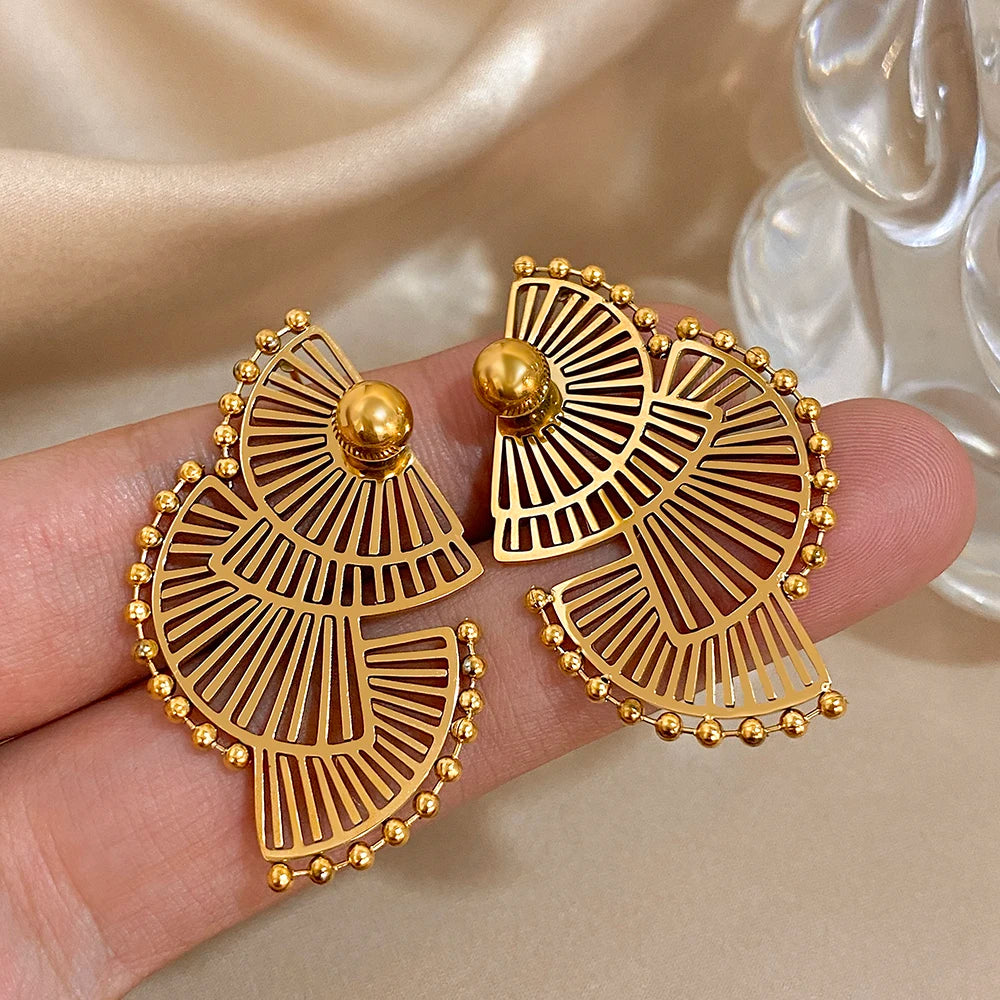 Gold-tone geometric fan earrings with openwork slats, bead edges, and round studs