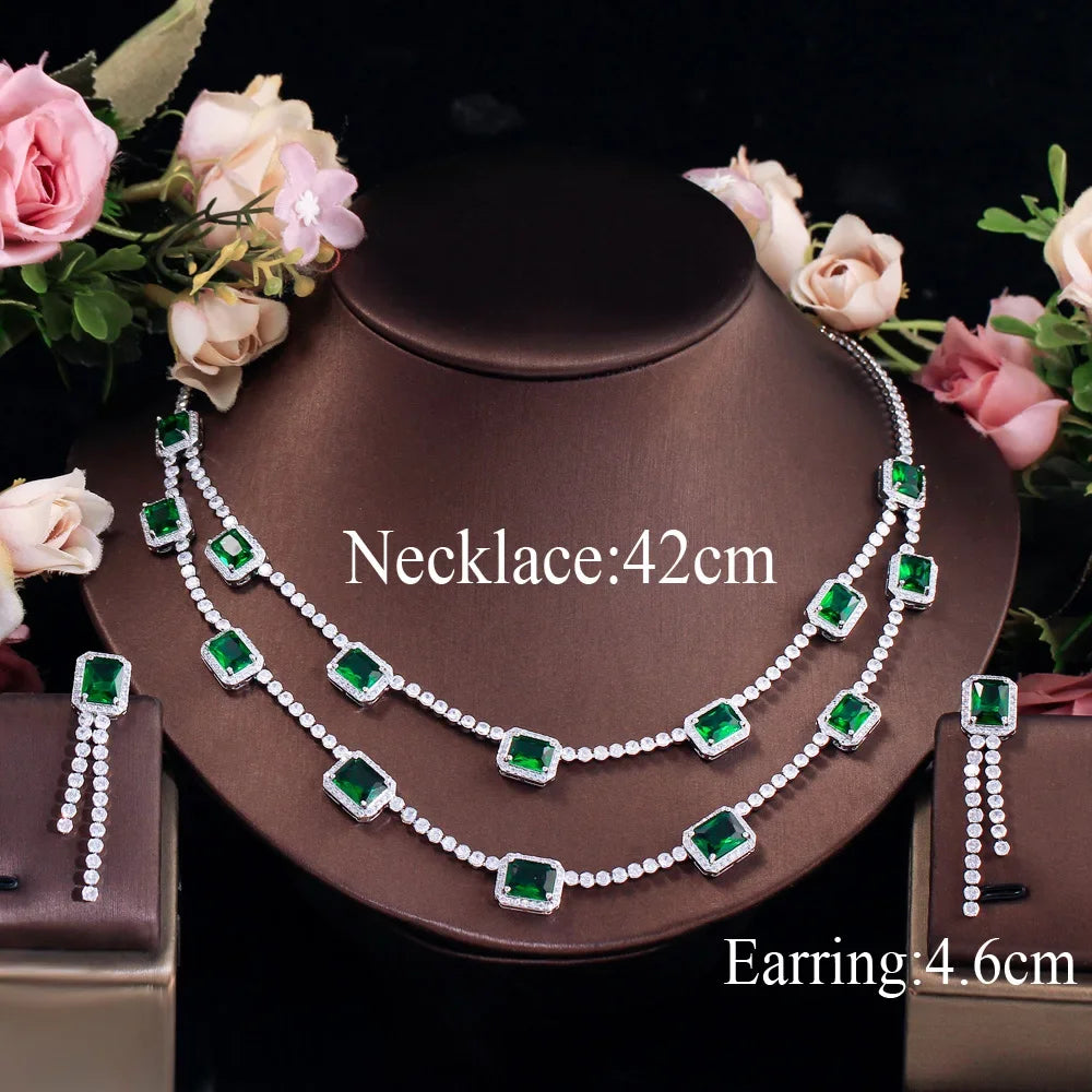 Green CZ rectangular double-layer necklace and beaded drop earring set on jewelry stand