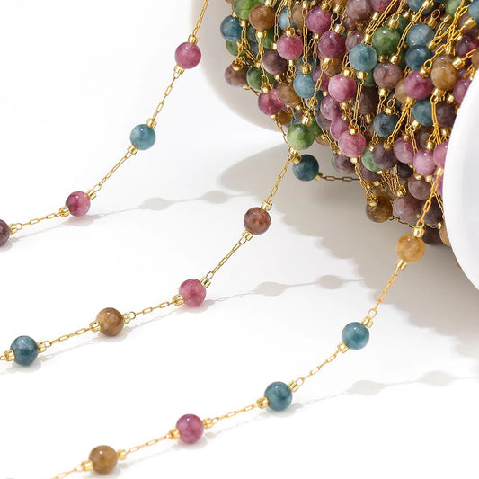 Gold-link gemstone bead chain strand with turquoise, amethyst purple, and brown beads