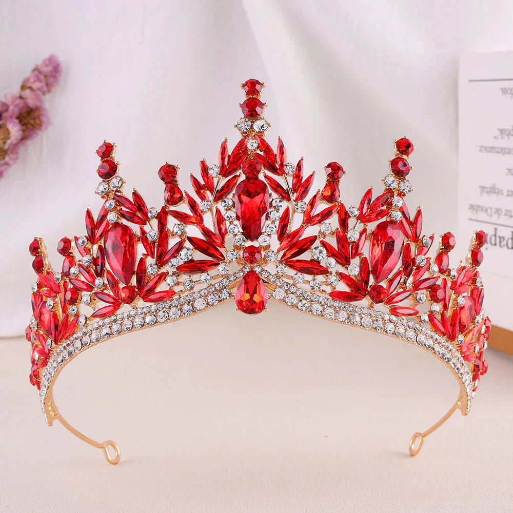 Red crystal rhinestone tiara with raised central jewel and teardrop stone fringe