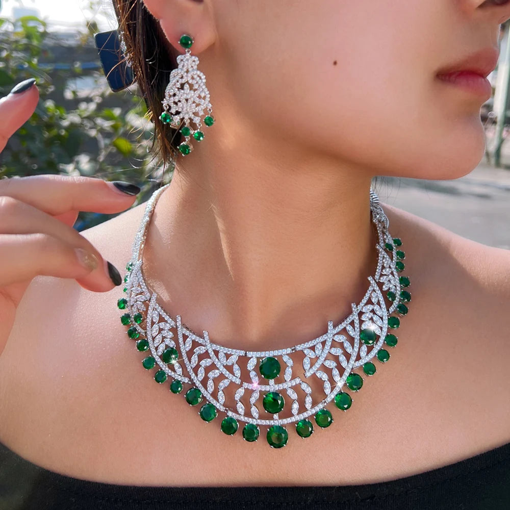 Silver-tone choker necklace with green stones and matching drop earrings