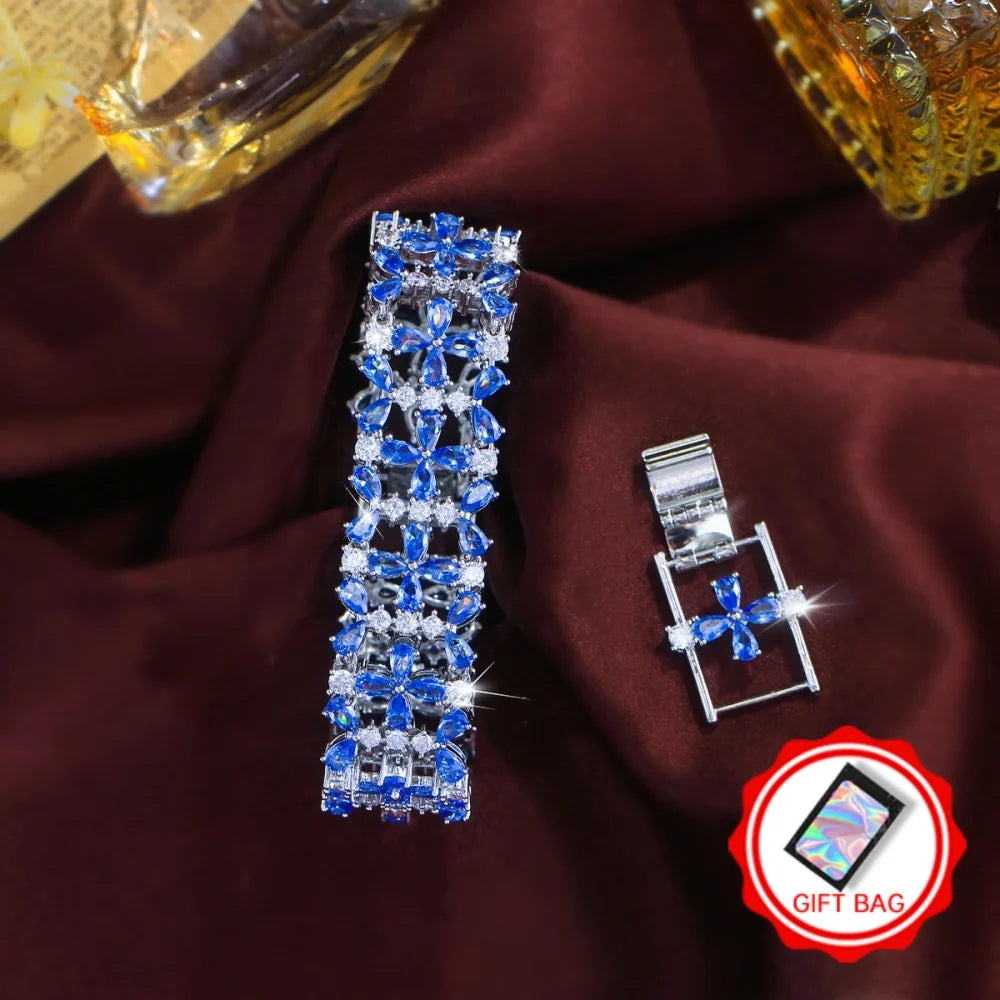 Blue floral crystal tennis bracelet with a matching extension clasp