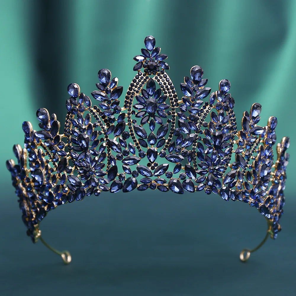 Blue crystal tiara crown with teardrop gems and ornate rhinestone arches