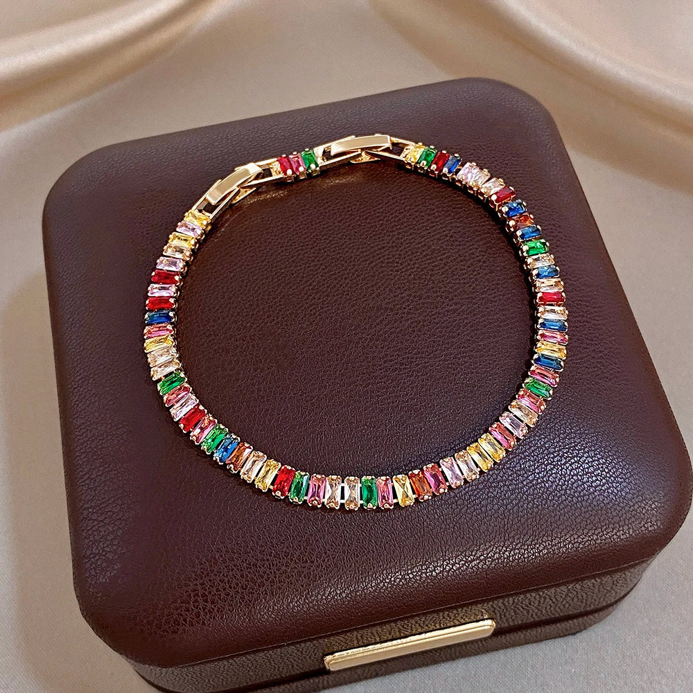 Gold-tone rainbow zircon tennis bracelet with rainbow crystal baguette stones