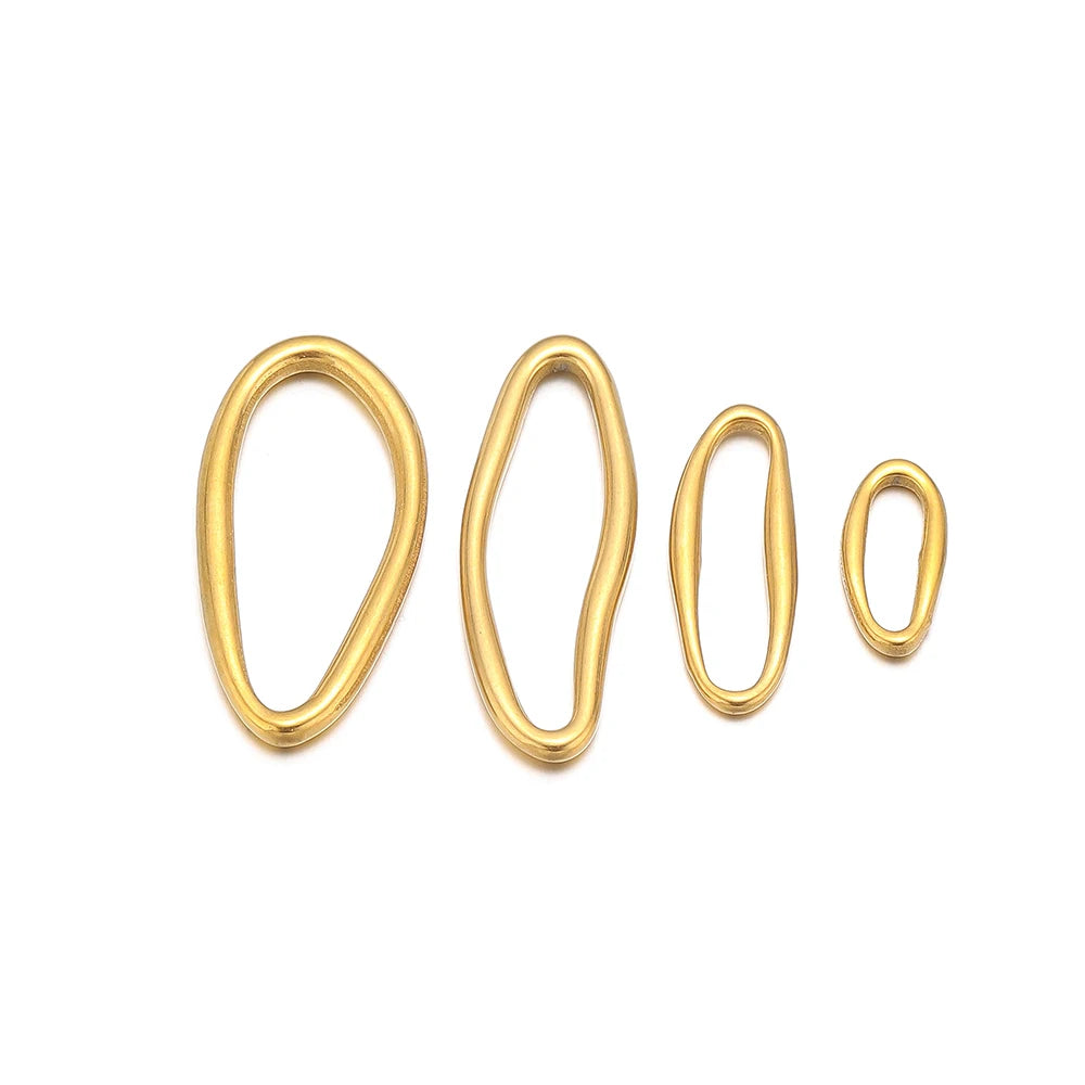 Gold oval metal charm links, smooth loop style, small set
