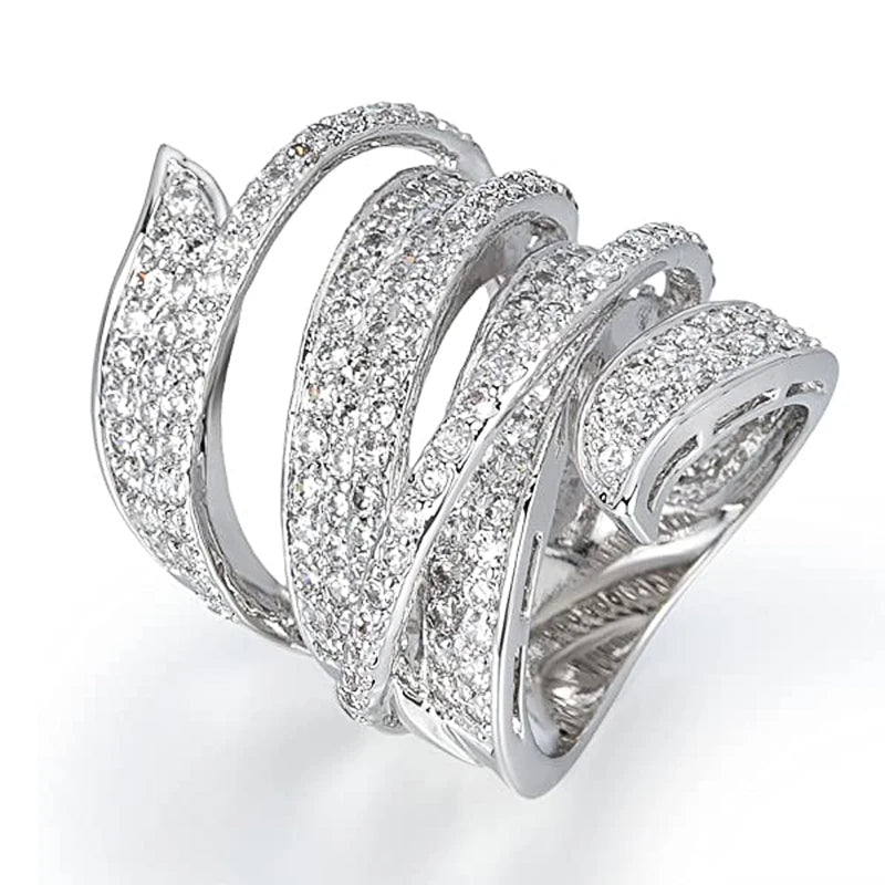 Shiny silver cubic zirconia pave wide stack ring with multiple curved bands.