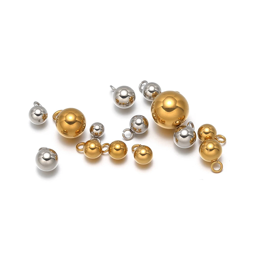 Mixed silver and gold plated ball charms with loop rings, solid spherical pendant beads
