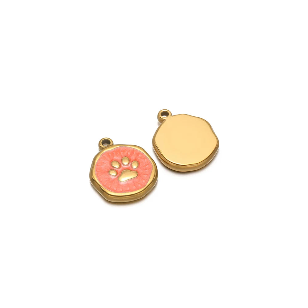 Enamel paw print charm pendant, orange-pink round with gold-tone border and plain gold-tone charm