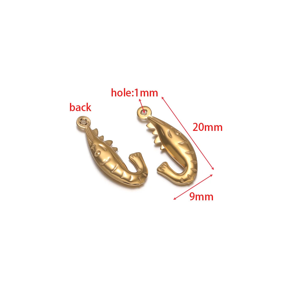 Gold-toned fish-shaped hollow charm with 1mm loop hole, stainless steel