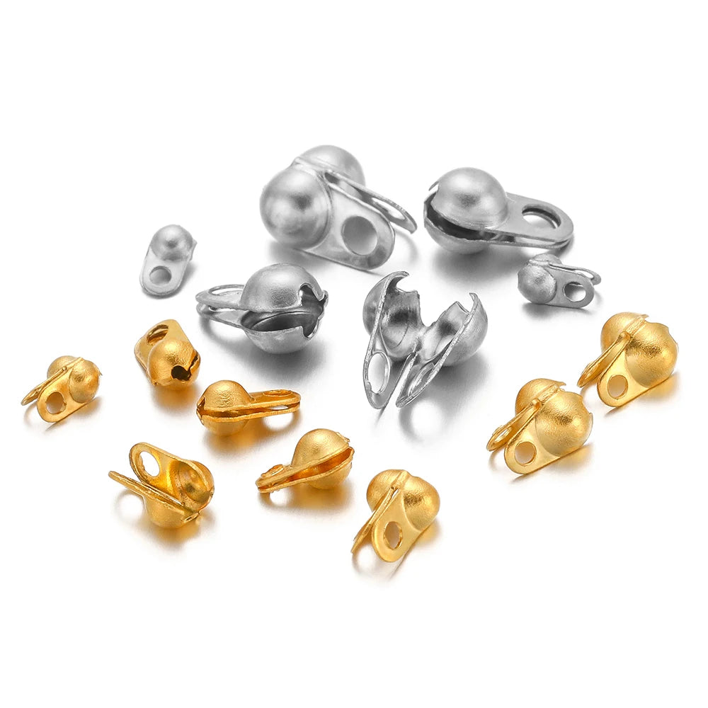 Assorted silver and gold tone end crimp bead hook connectors, small metal clasps