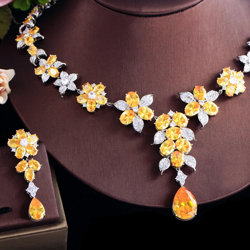 Close-up of flower zircon necklace centerpiece and matching yellow drop earring