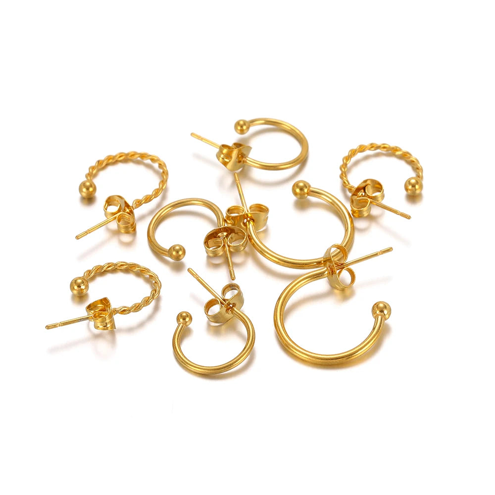 Gold-tone earring hook connectors mix with hoop rings and bead-like ball details
