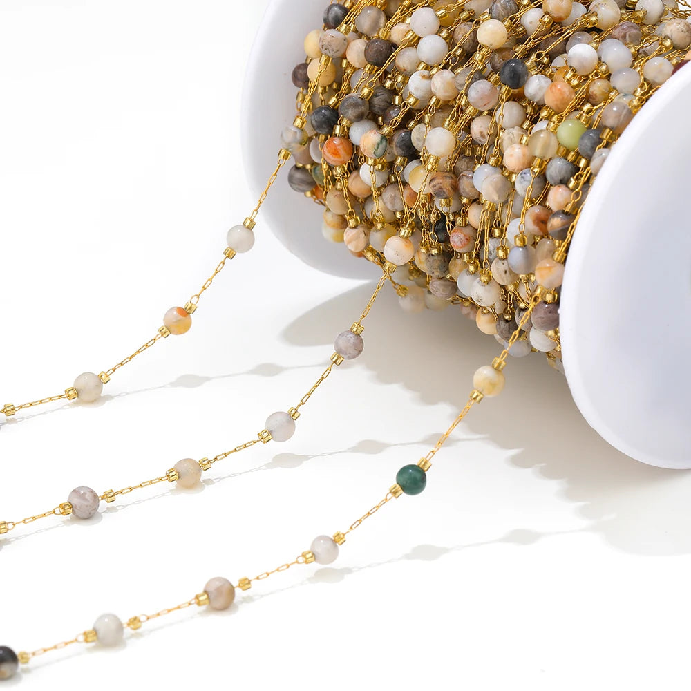 Gold-link gemstone bead chain strand with white and pastel beads