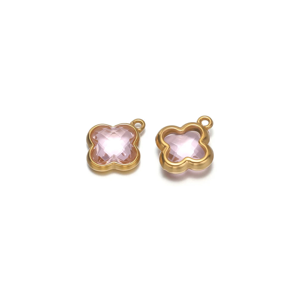 Four-leaf clover glass charm pendant with light pink gem and gold-tone loop