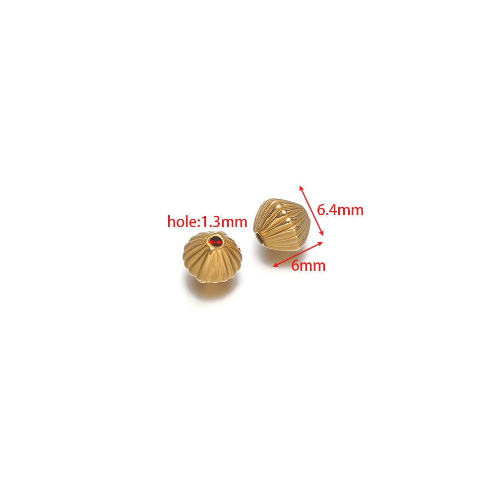 Gold ribbed striped pumpkin spacer beads with 1.3mm hole, rounded ridges