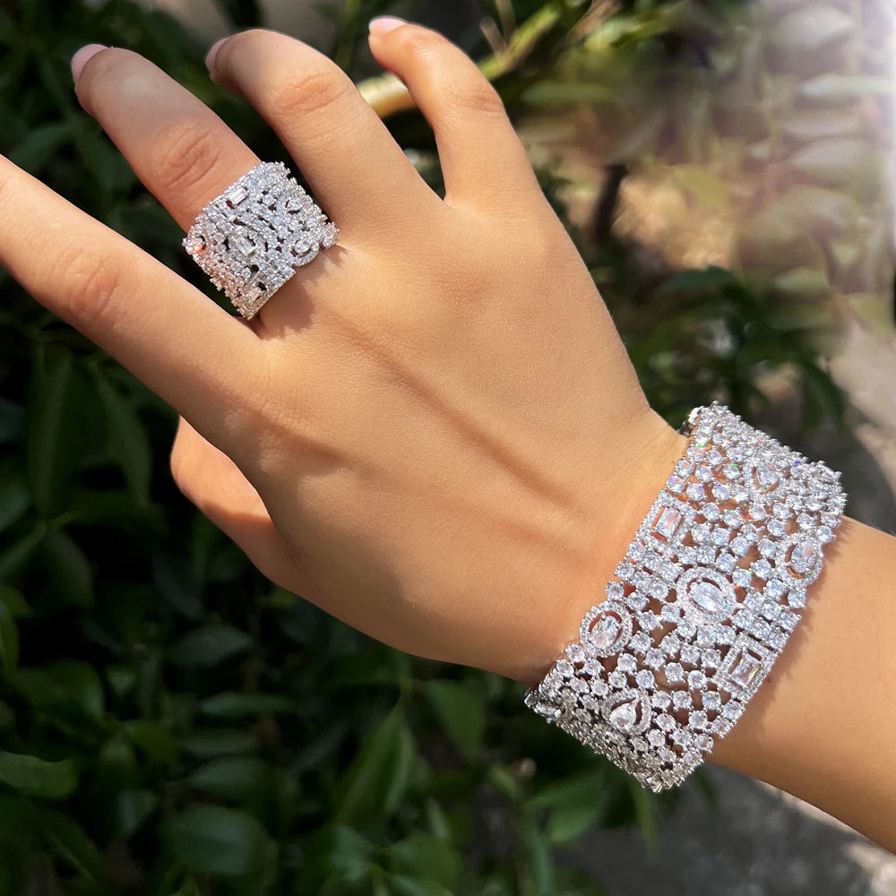 Silver-tone cuff bracelet and matching wide ring, shown from another angle