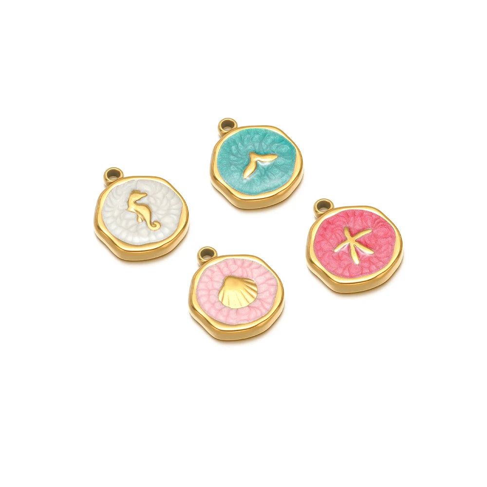 Enamel animal charm pendants: teal, white, pale pink, and pink star motifs with loops