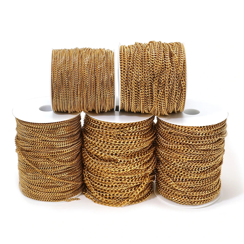 Gold-plated stainless steel Cuban link chain rolls on spools for DIY jewelry making