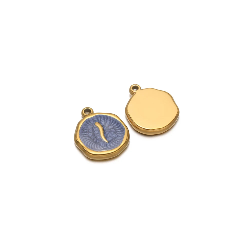 Gold-tone round charm with blue anchor enamel, plus blank gold-tone round charm