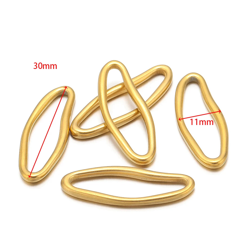 Gold irregular oval charm links with size marks 30mm and 11mm