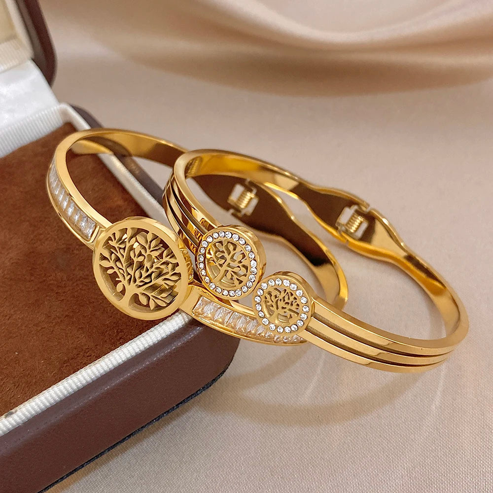 Gold-tone bracelet set with tree-of-life charm and mixed clear stone bands